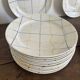 Vintage Longchamp France service – 18 graphic plates from the 1950s.