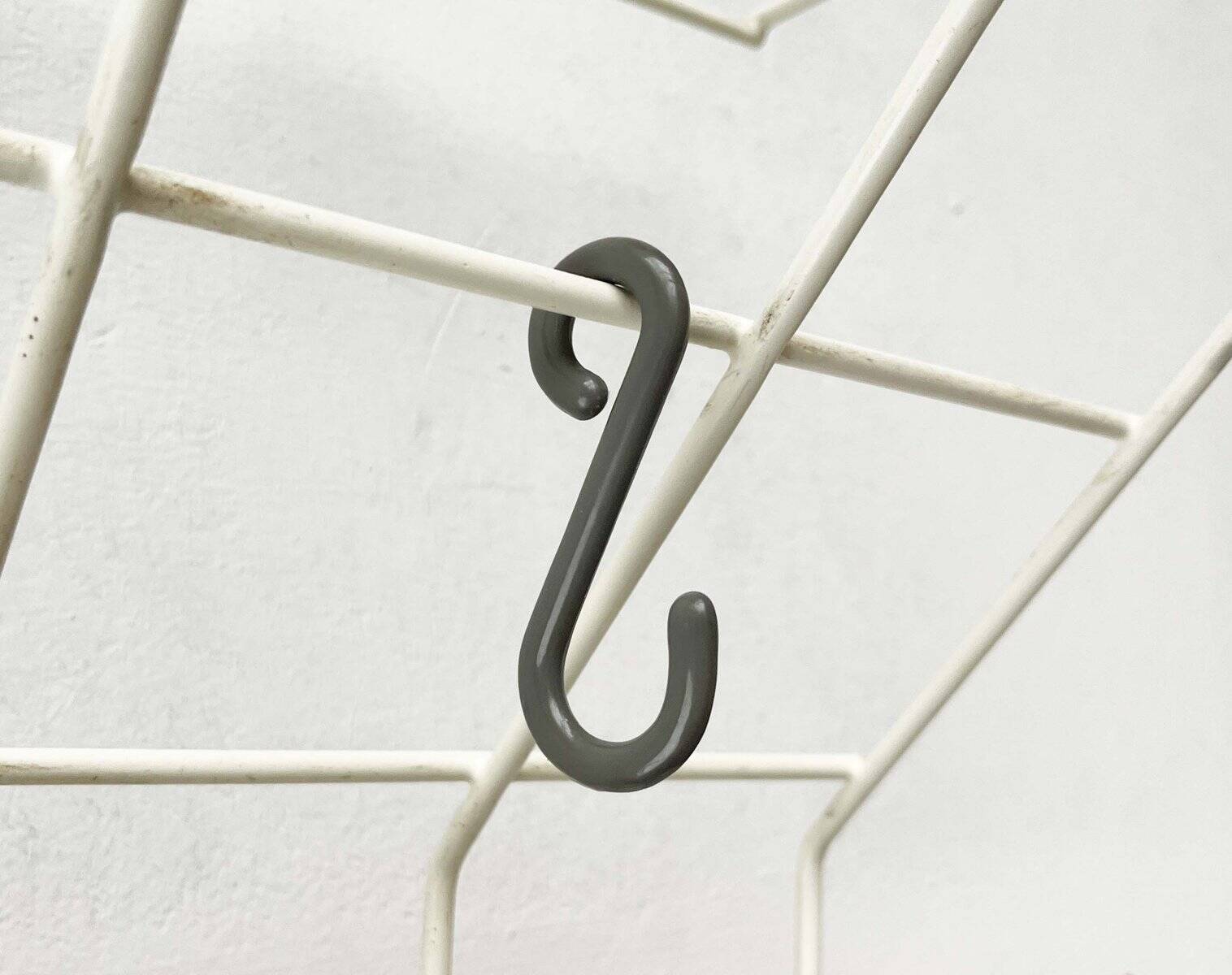 Minimalist white wire coat rack from mid-century Germany, 1960s.