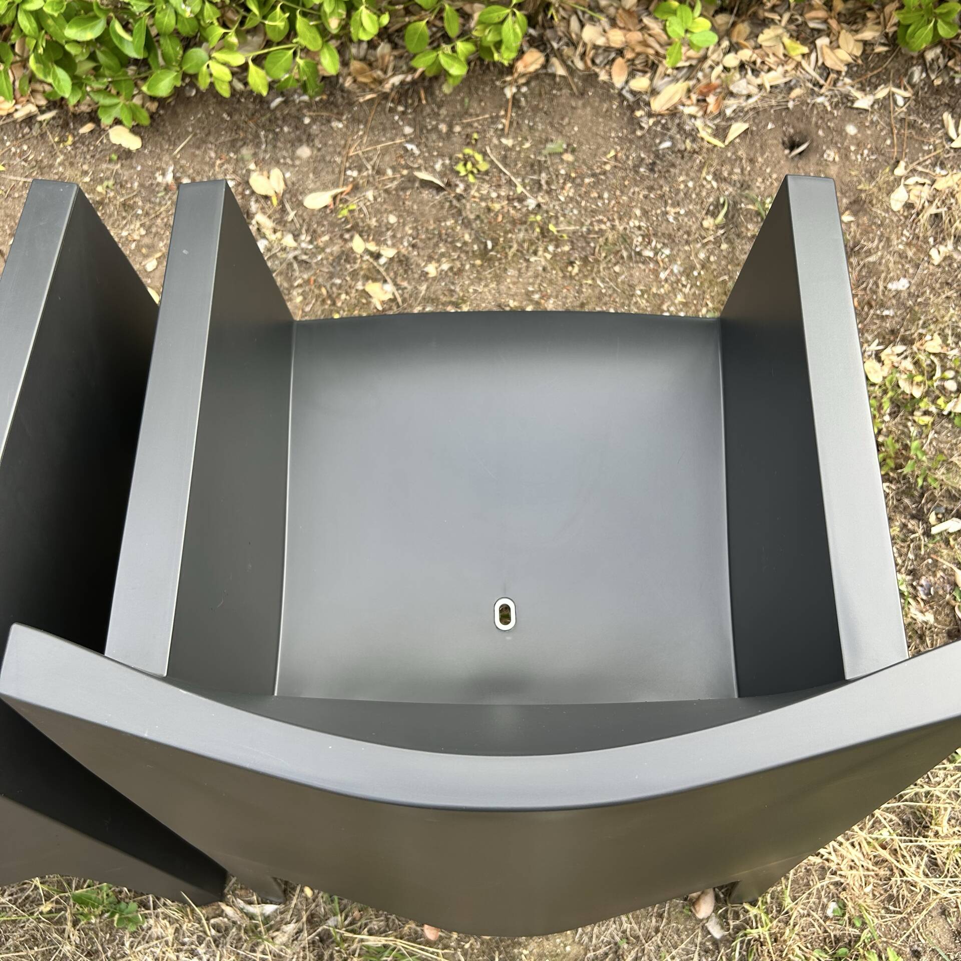2 black Toy chairs designed by Starck