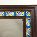 Mirror with wooden frame and painted ceramic tiles
