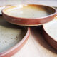 5 small plates in sandstone