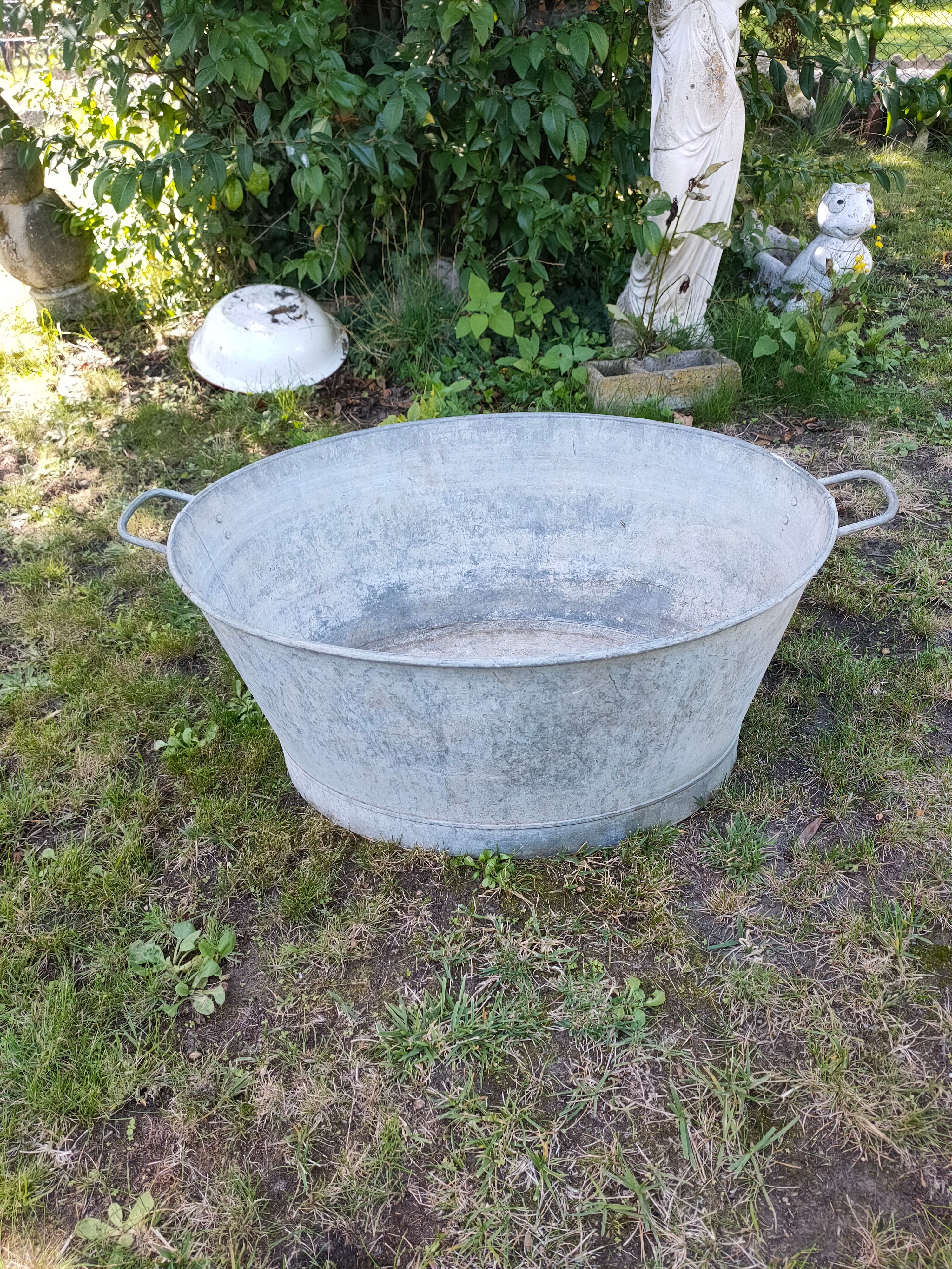 Old oval zinc basin