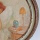 Ancient oval painting of a sleeping woman in oil on wood panel.