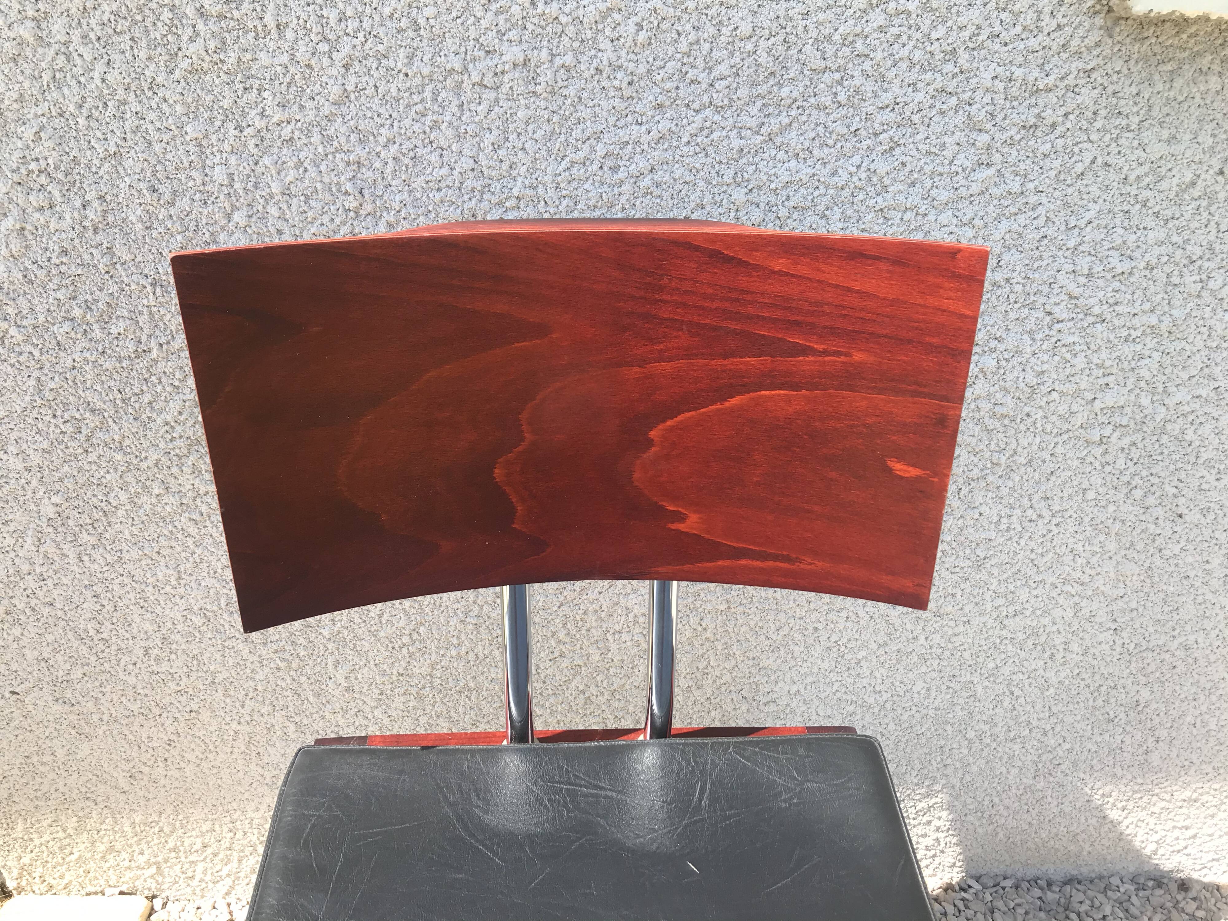 Suite de 9 chaises skaï noir et chrome scandinave