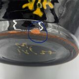 Black vase M/V floral patterns