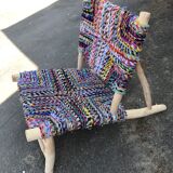 Wooden armchair braiding multicolored fabrics