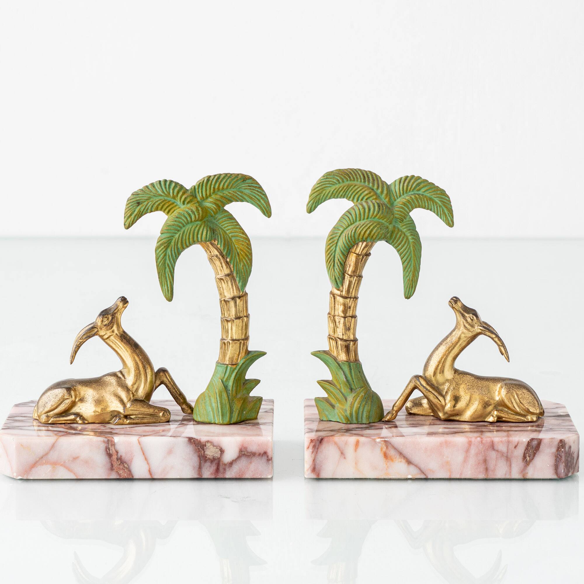 Pair of Art Deco Bookends in Pink Breccia Marble with Antelope and Palm Tree