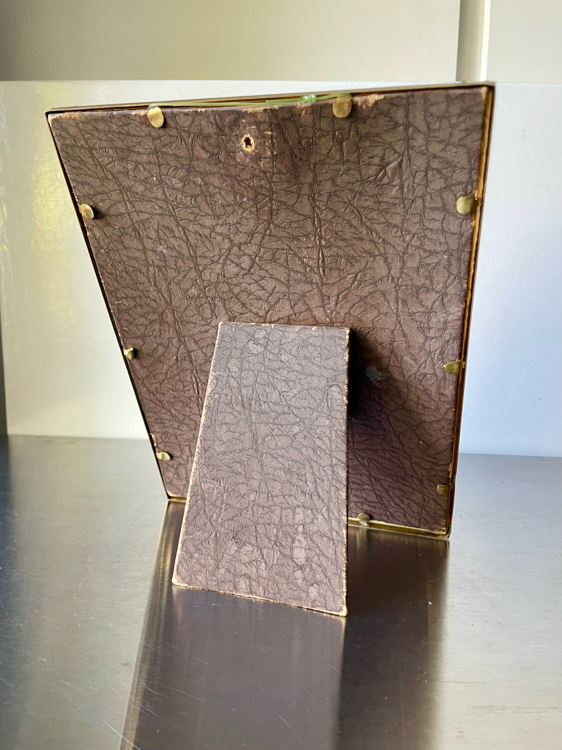 Metal vintage frame in gold colored brass