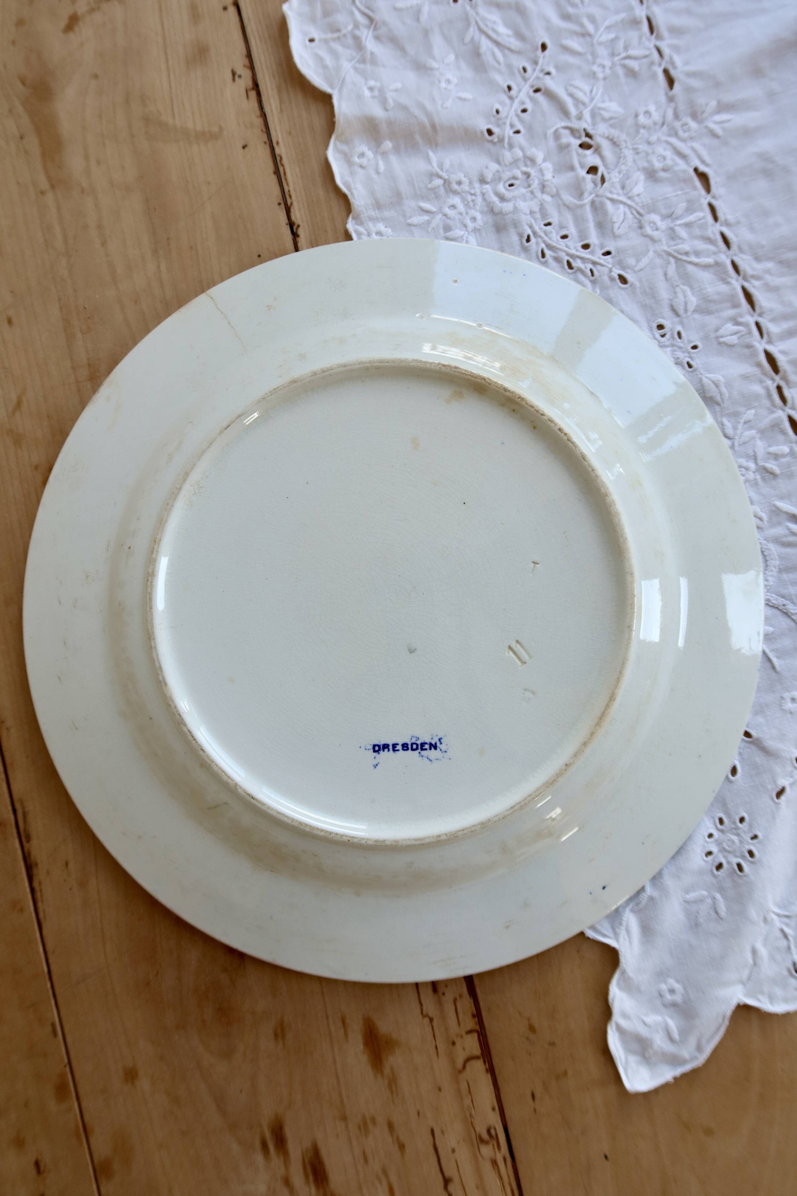 Large round antique plate, blue and white Dresden porcelain.