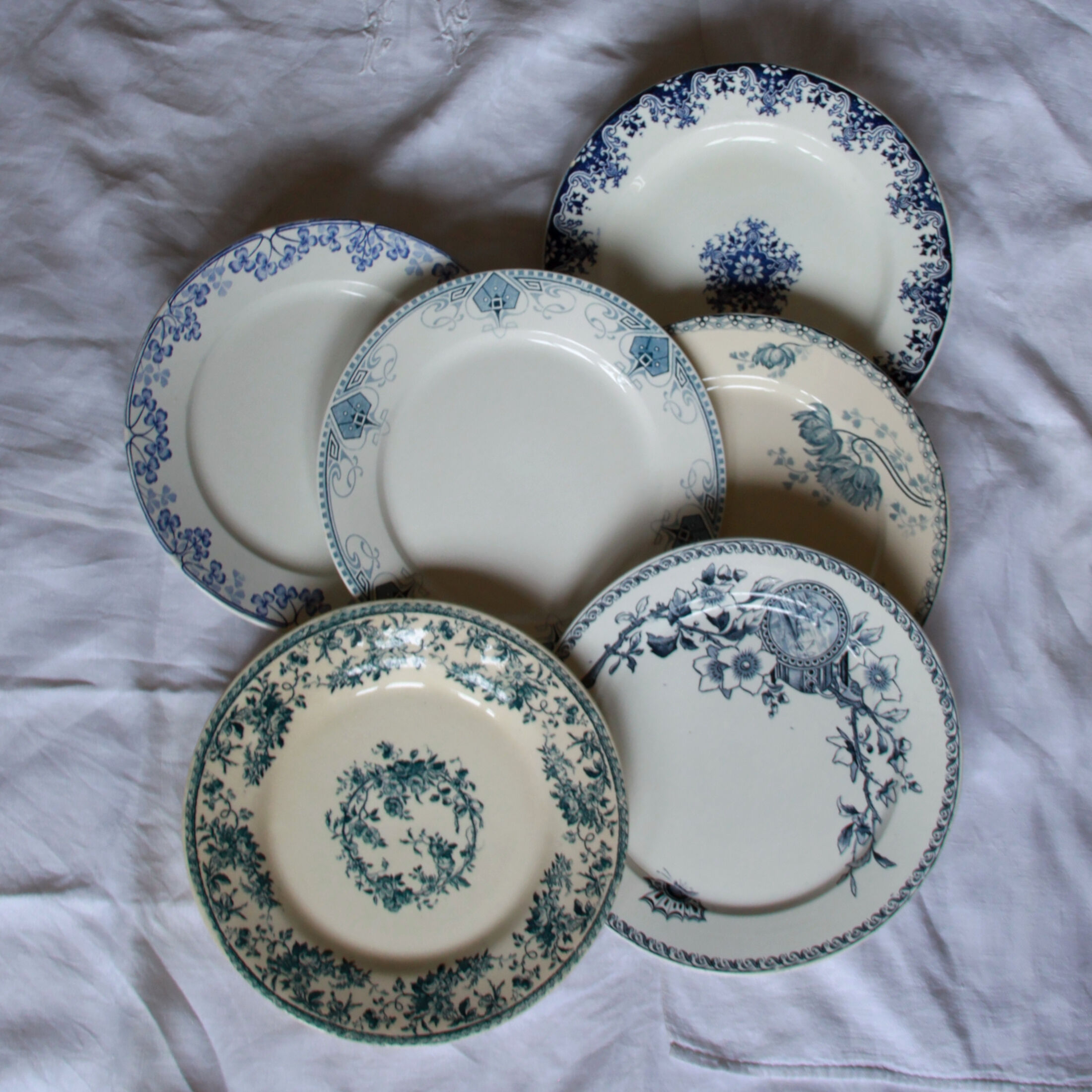 Set of 6 mismatched iron earth plates Sarreguemines Gien Royat Germaine Vichy