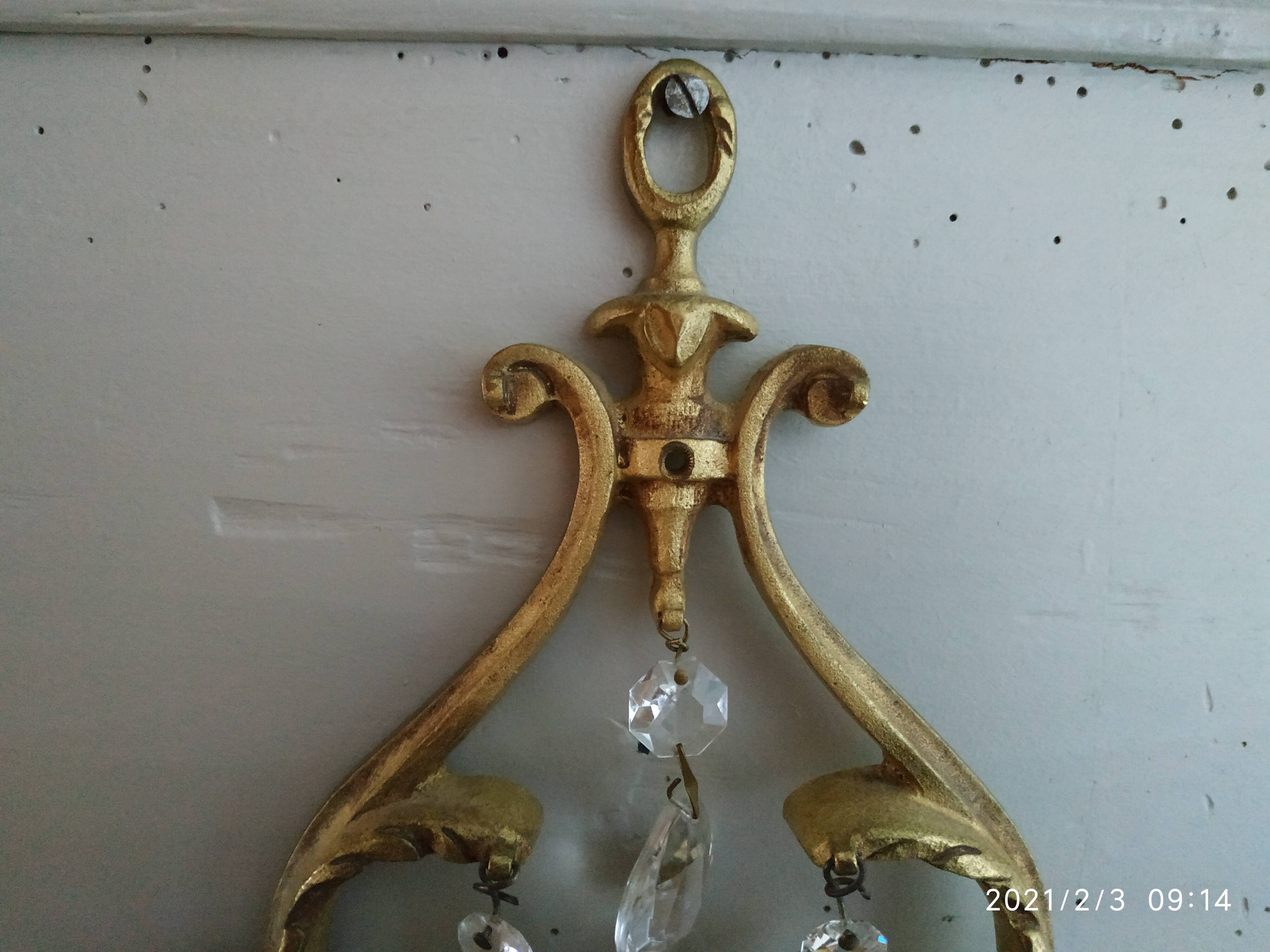 Bronze and stamps sconce