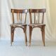 Paire de chaises bistrot Baumann 1955 assise bois