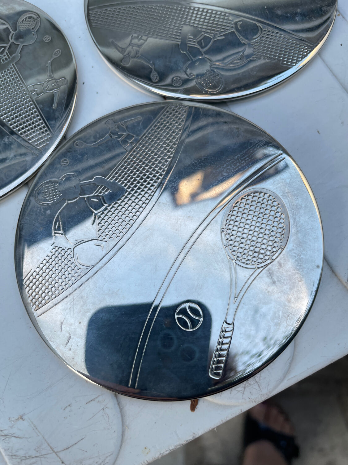 Coaster with tennis theme holder