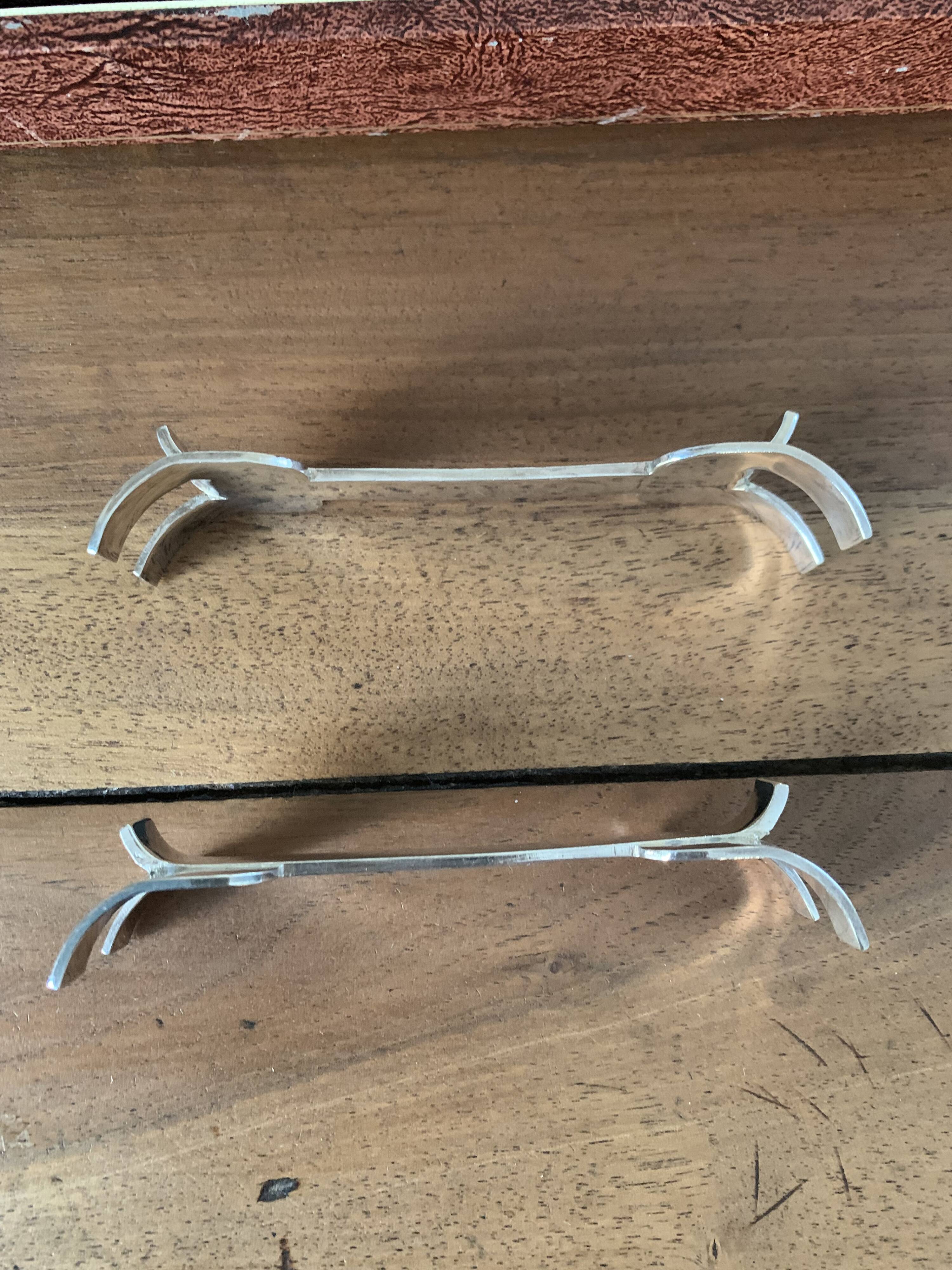 Box of 12 Orbrille silver-plated knife rests