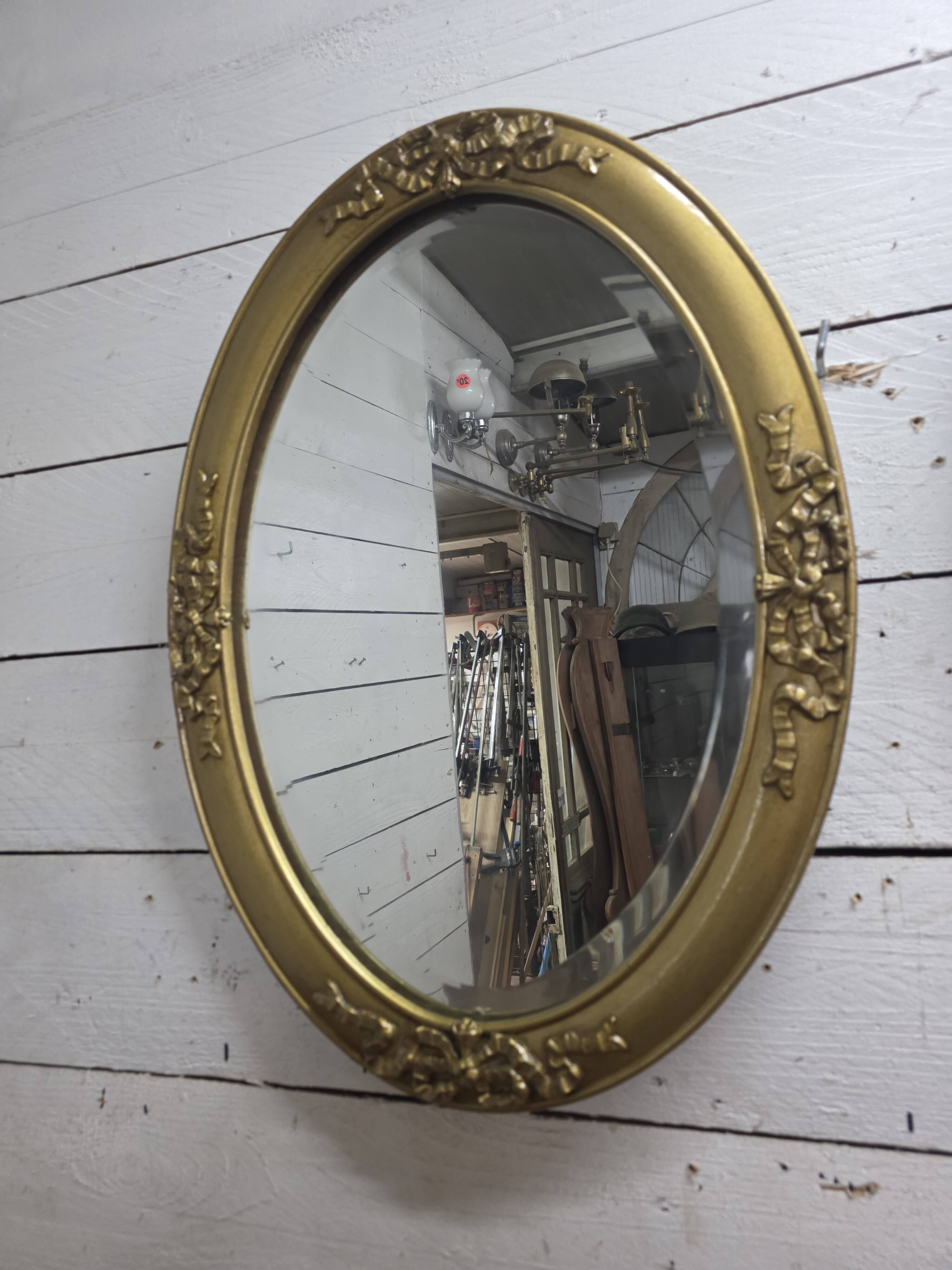 Miroir ovale style Louis XV doré miroir biseauté