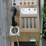 Publiphone de cabine à pièces