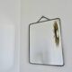 Old barber's mirror with chain, 1950s and 1960s
