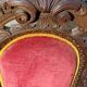 Paire de fauteuils anciens, sculptés en noyer.