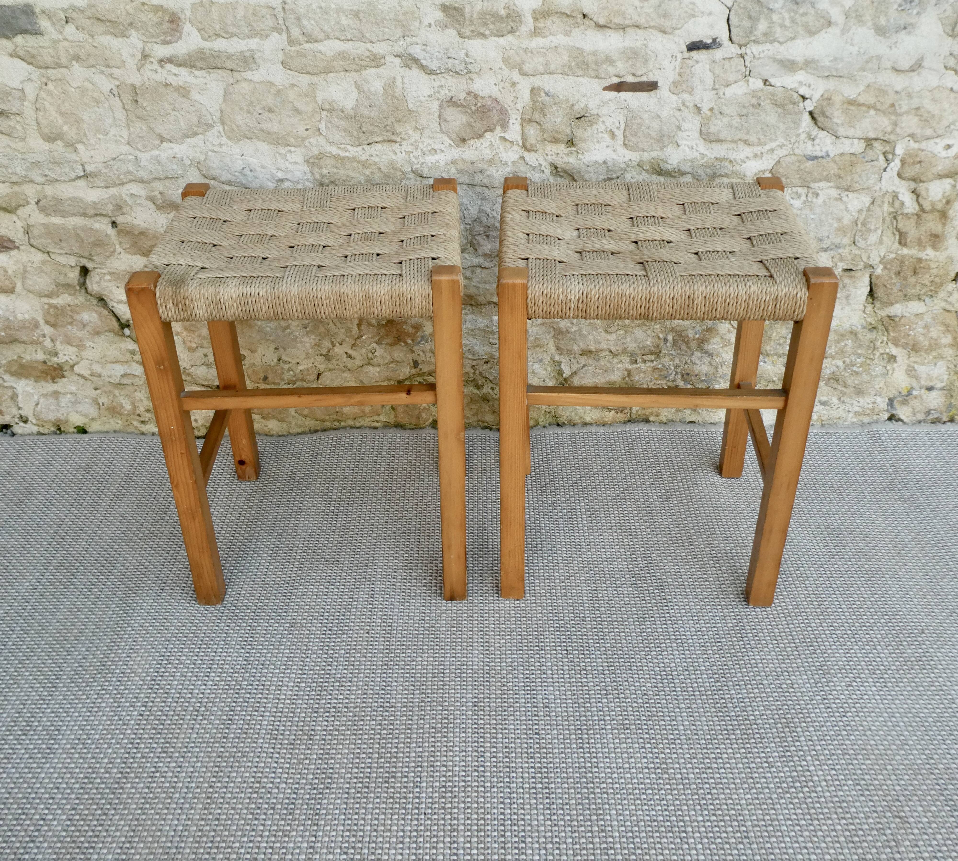 Pair of light wood stools and braided rope, 60s