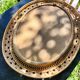 Oval rattan mirror
