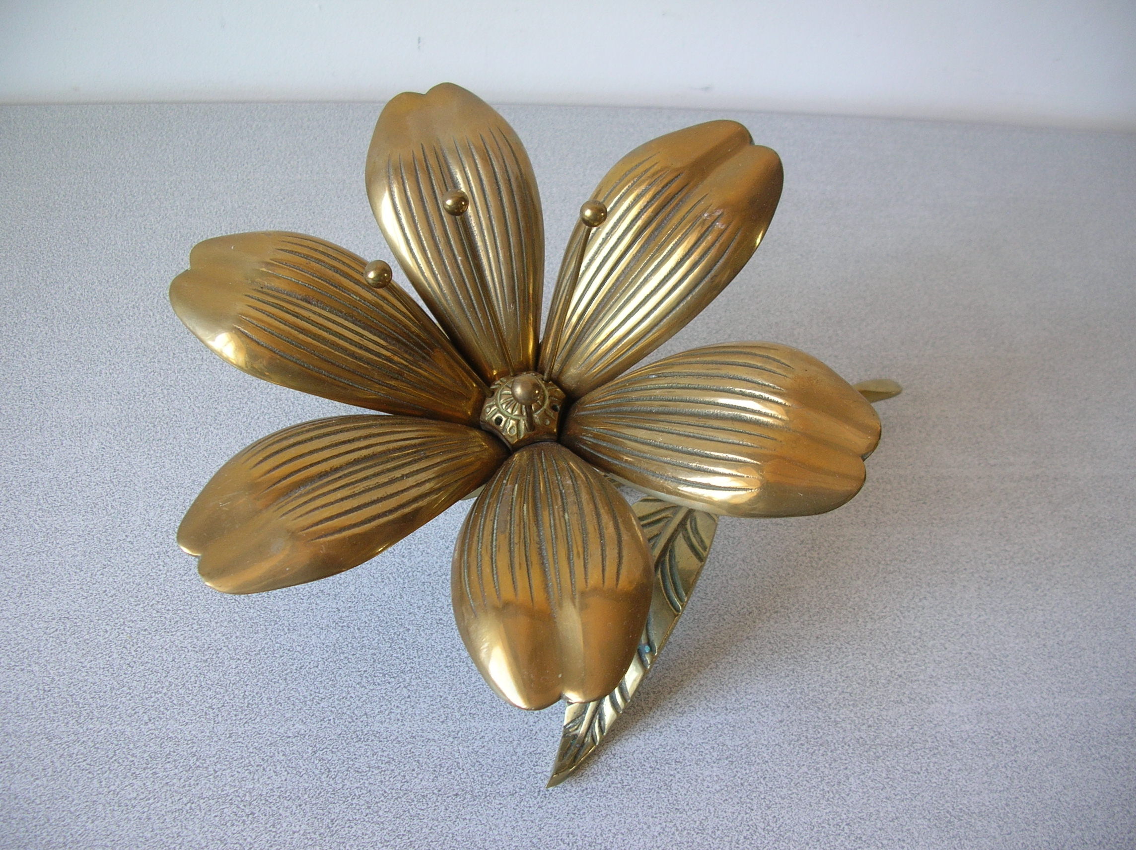 Ancient bronze flower 6 petals in ashtray