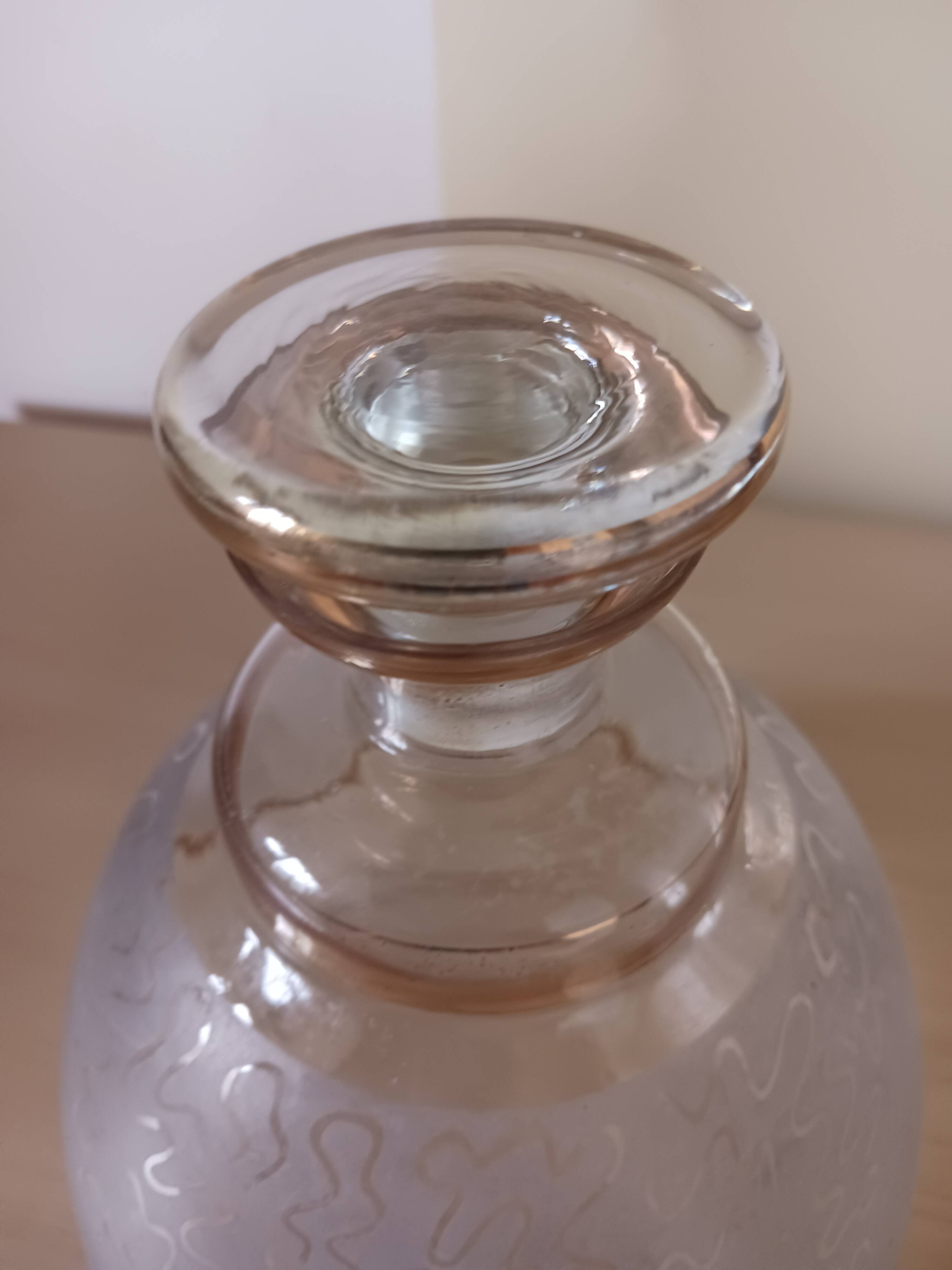 Antique carafe, made of glass.