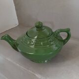Green earthenware teapot