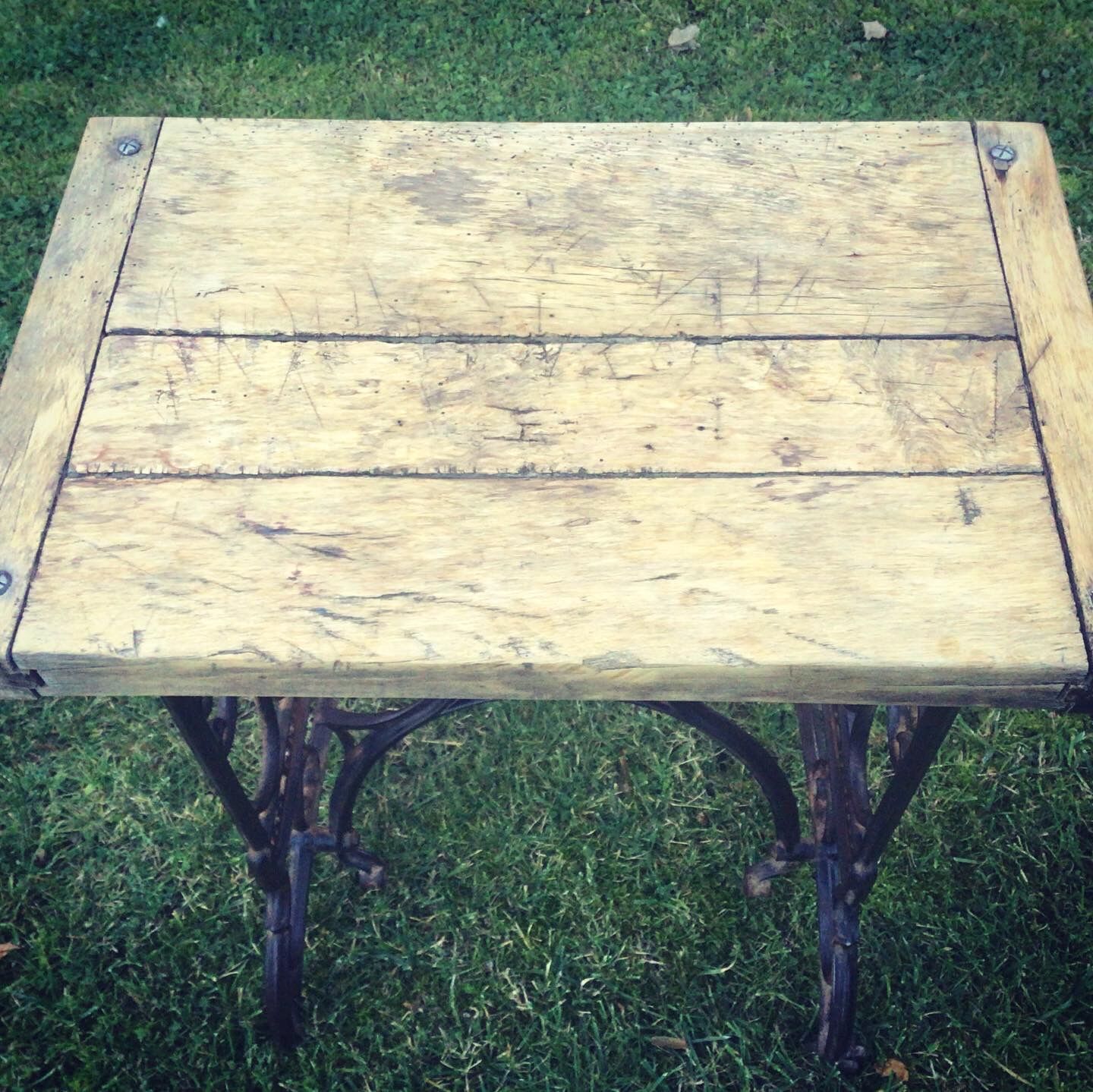 Established solid wood and cast iron console
