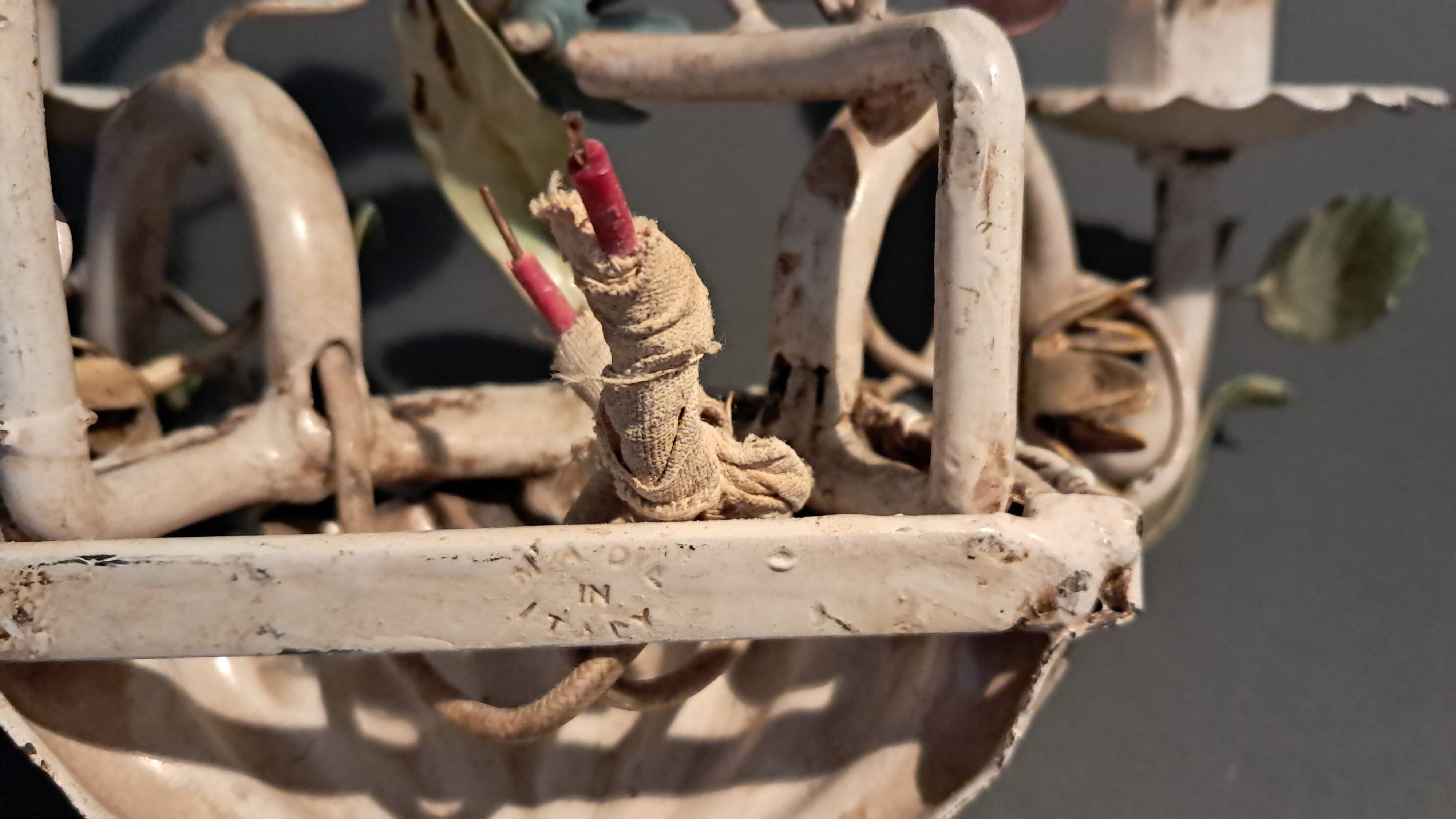 Two-light polychrome painted wrought iron wall lights, Italy 1950/1960.