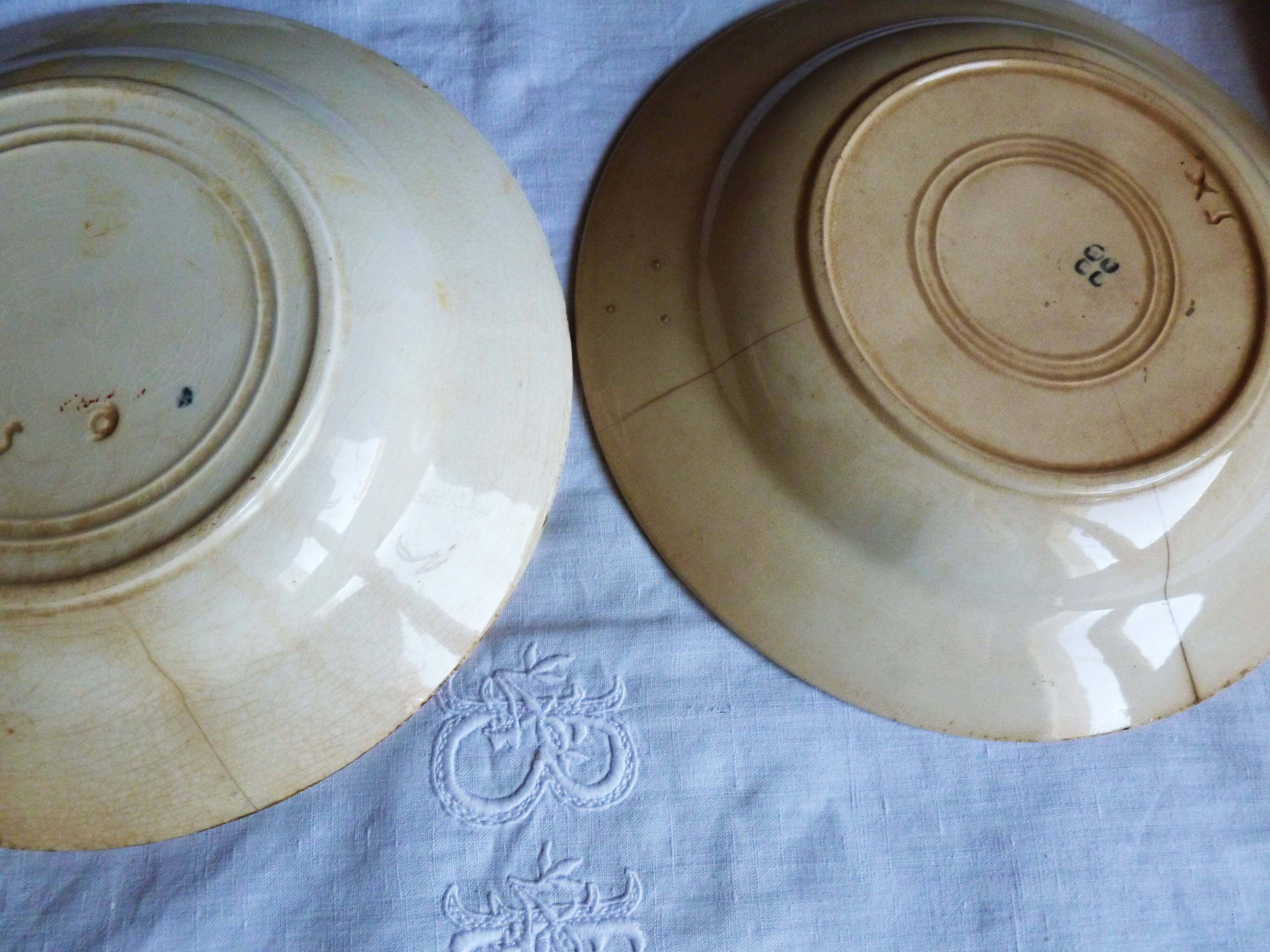 Antique deep plates from the late 19th century, old French crockery.