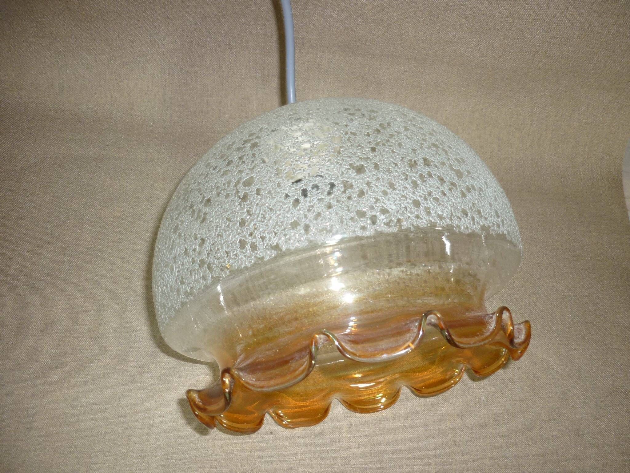 Chandelier in scratched glass and moiré rim