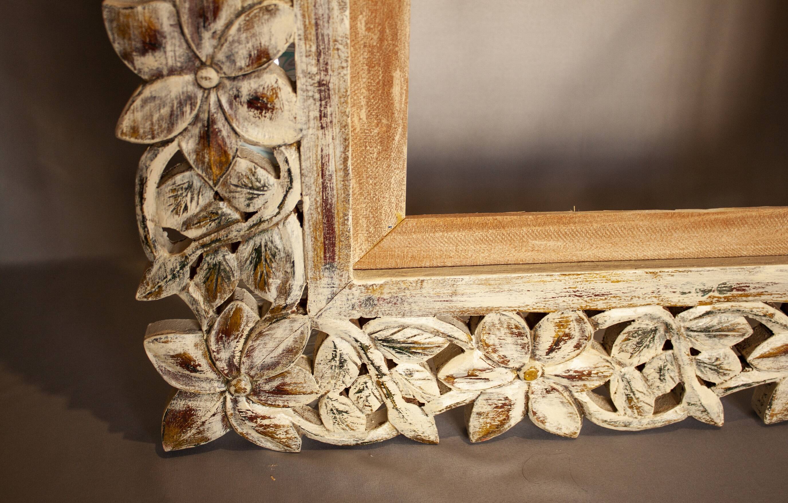Carved wooden frame. carved wooden frame with floral motifs.