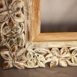 Carved wooden frame. carved wooden frame with floral motifs.