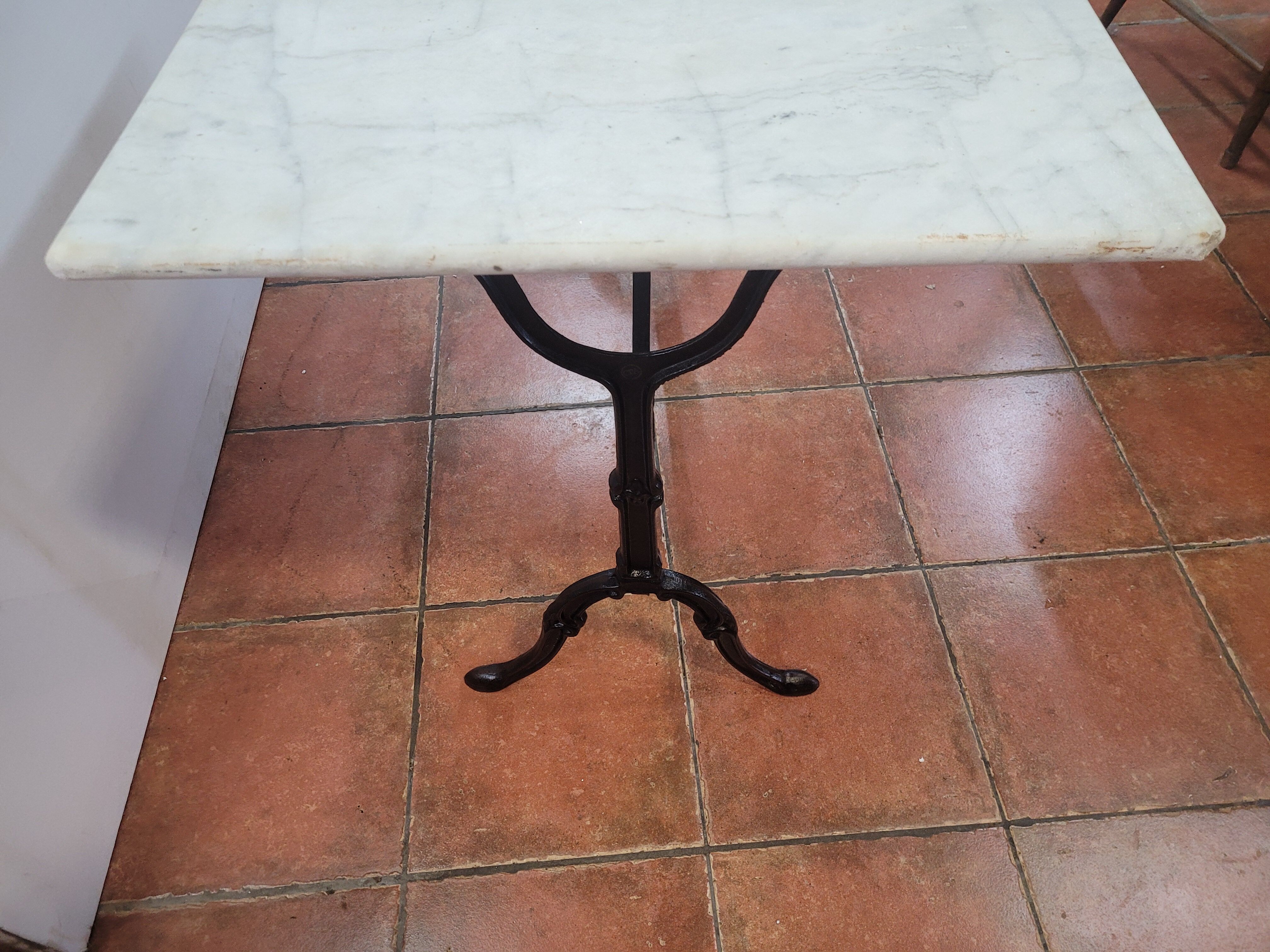 Bistro table base cast iron over marble