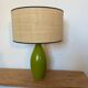 Vintage green glazed ceramic lamp and cane shade