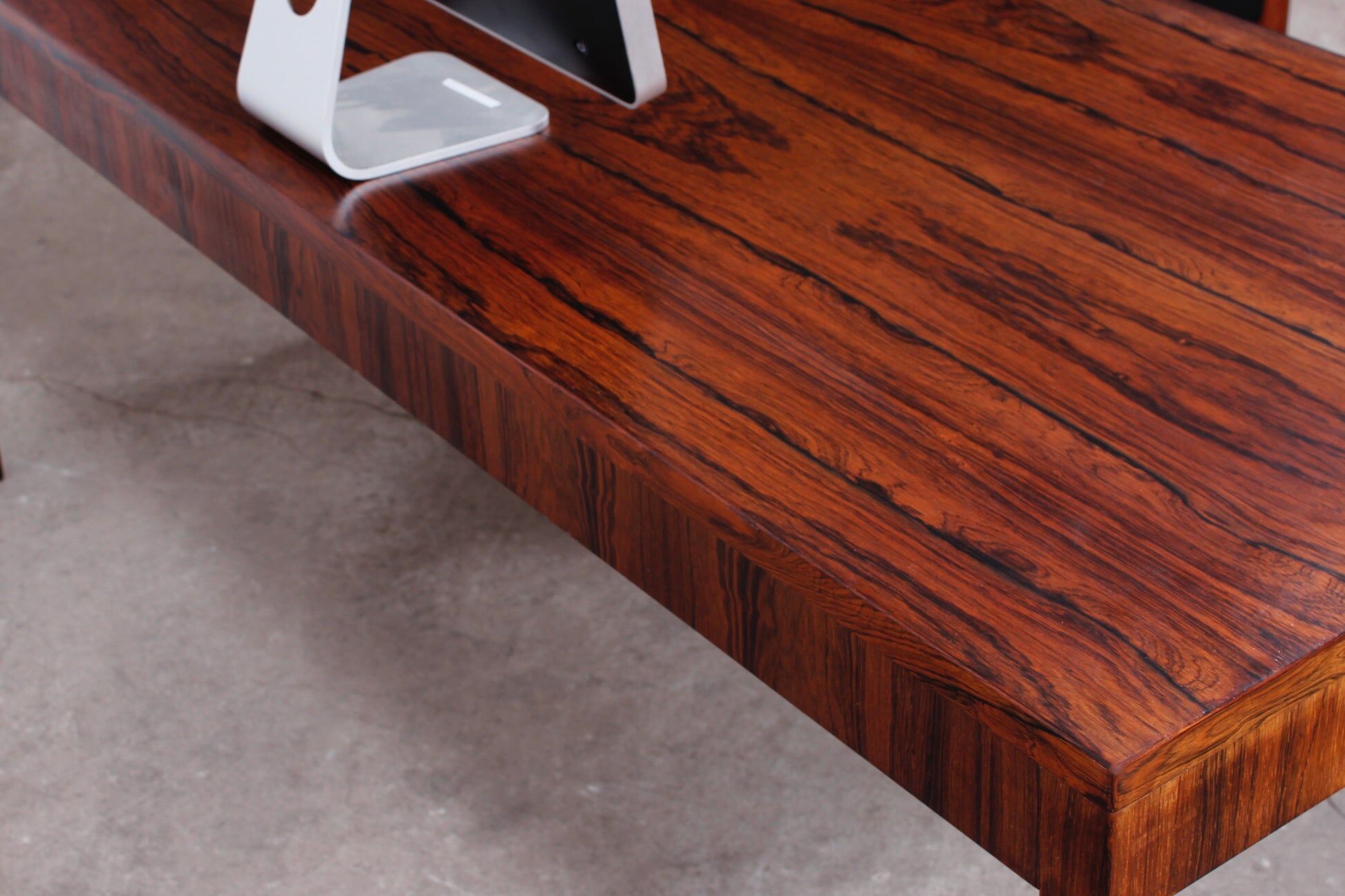 Minimalist rosewood desk by Riis Andersen