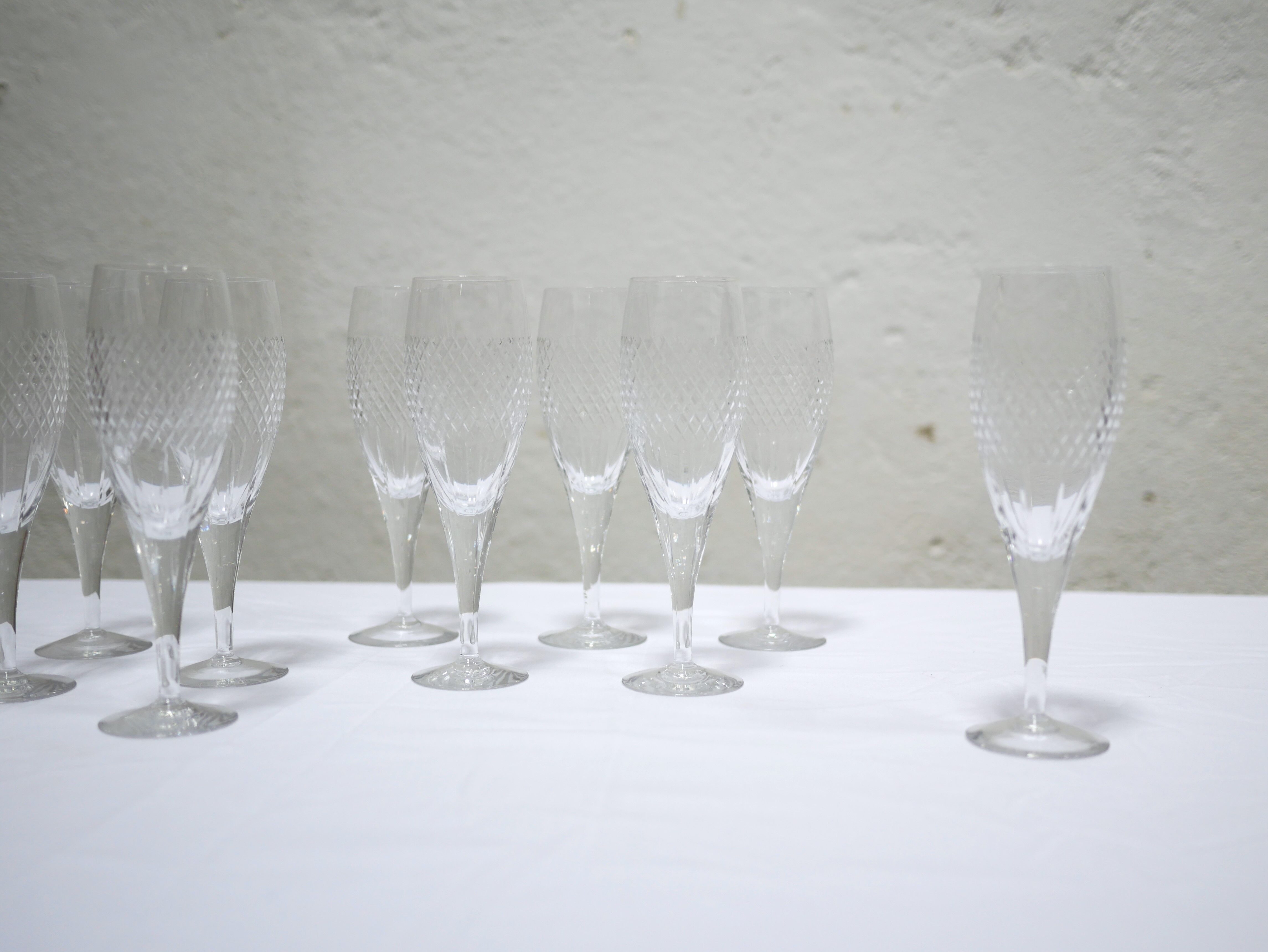 Series of 10 vintage crystal champagne flutes