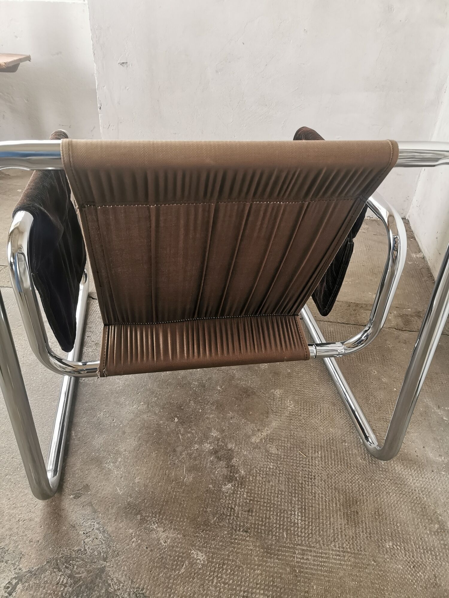 Velvet and tubular metal armchair 1980