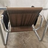 Velvet and tubular metal armchair 1980