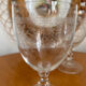 Set of two engraved glass wine glasses