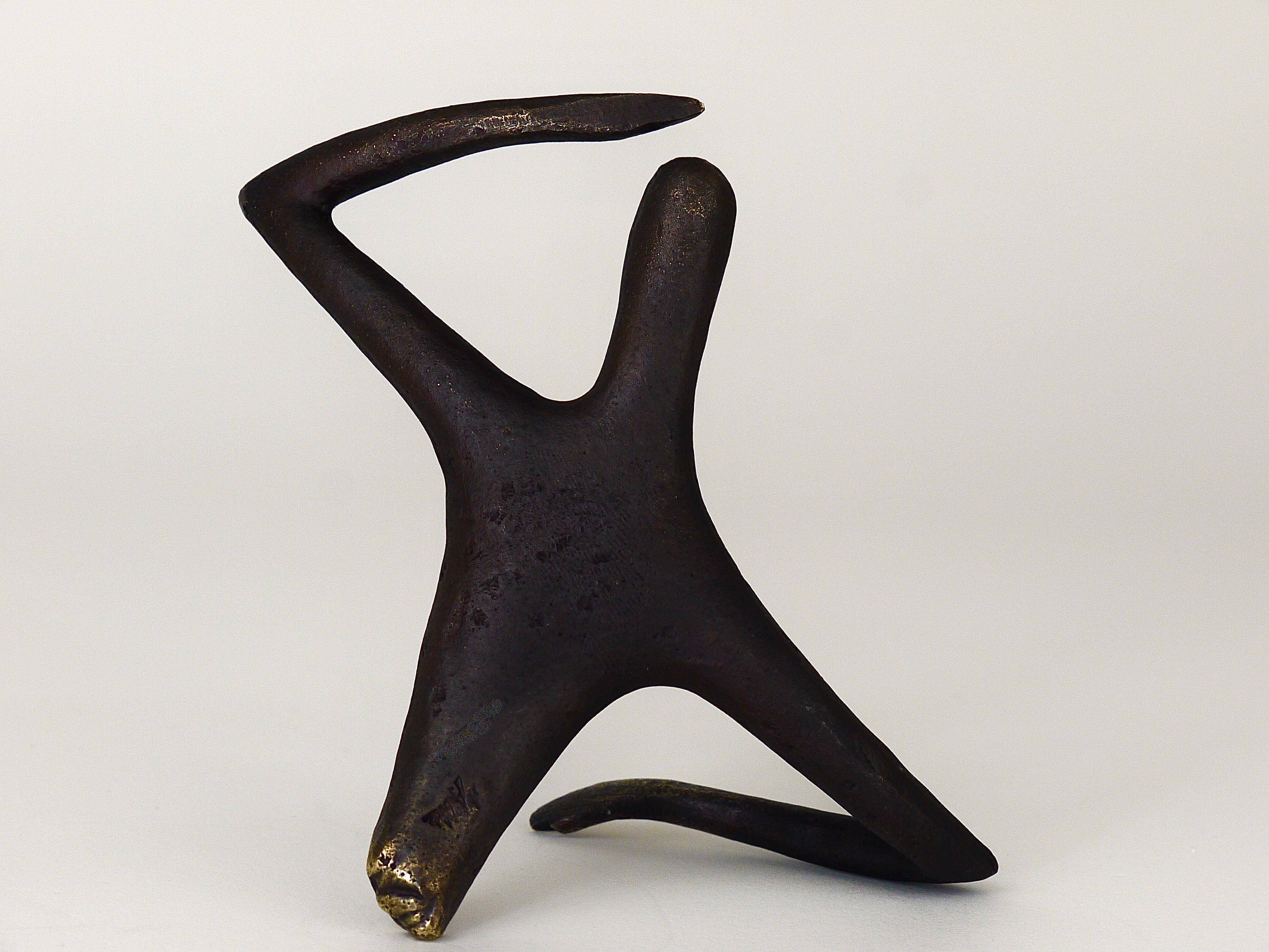 Handmade brass sculpture by Carl Auböck, Optimist Pessimist, model no. 4059.