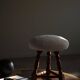 Modern Danish, a pair of tripod stools, seats reupholstered in lambswool, 1950s.