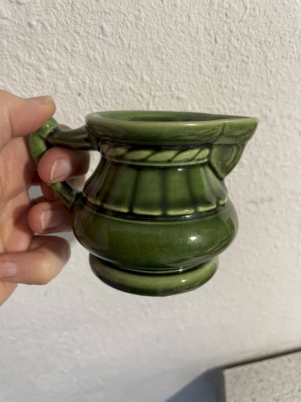 Green ceramic milk jug