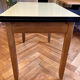 Expandable yellow formica table