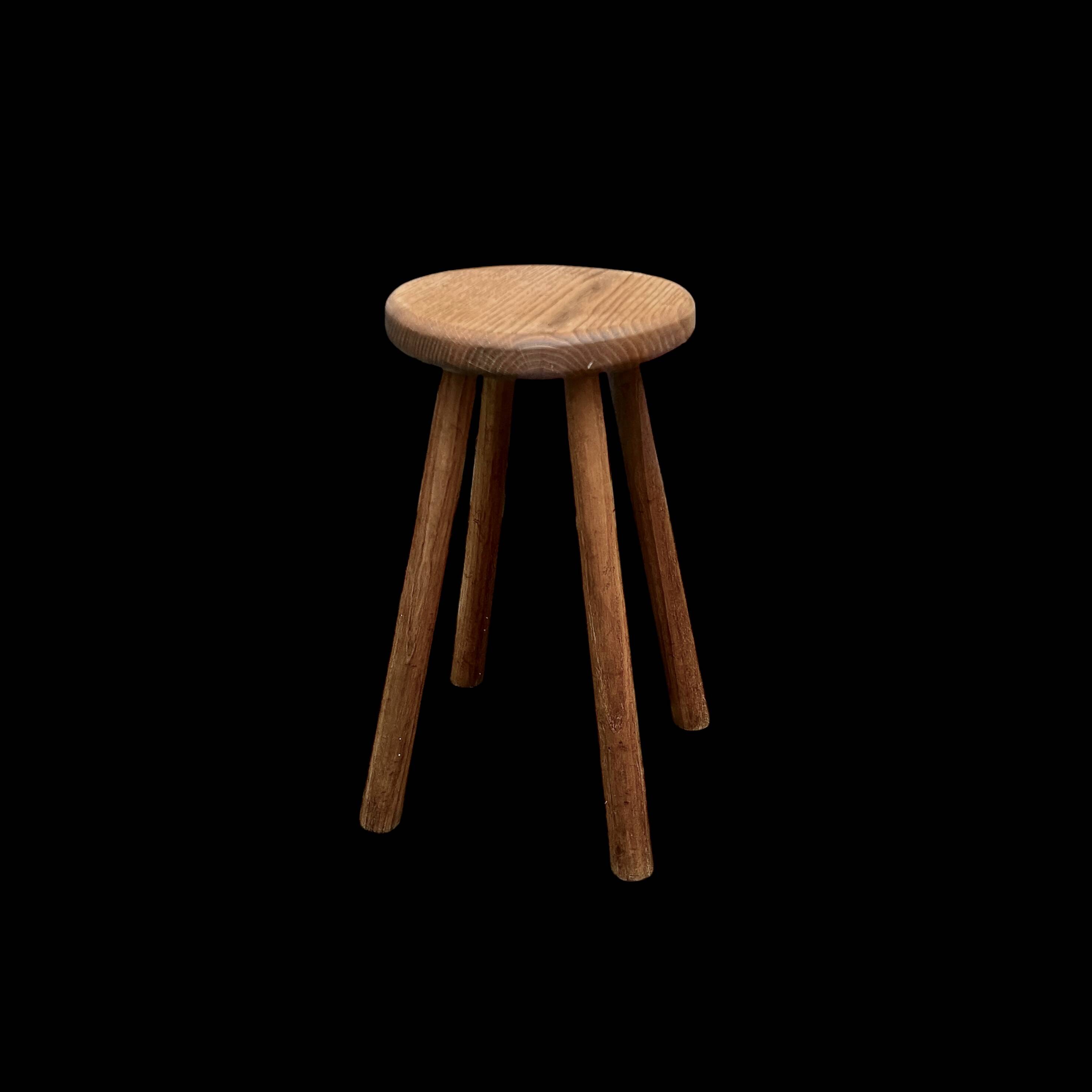 Antique solid wood four-legged stool – rustic & decorative piece