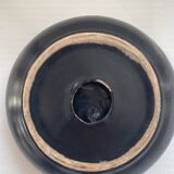 Black ceramic ashtray from the 1950s
