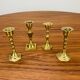 4 vintage gold-plated brass candlesticks