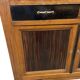 Vintage Art Deco display cabinet in wood with green stained glass.