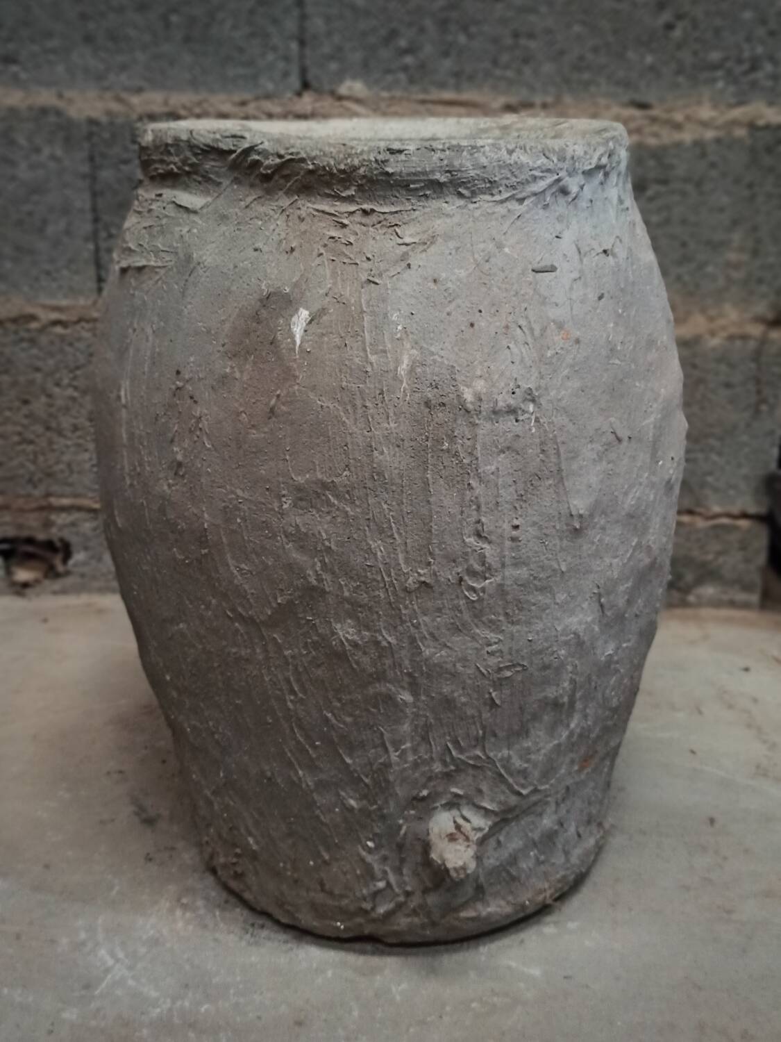 Old gray terracotta pot