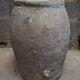 Old gray terracotta pot